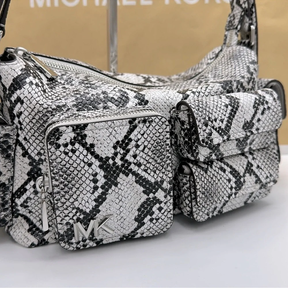 MICHAEL KORS Dakota Md Snake Embossed Leather Pocket Shoulder Bag
ALUMINUM
NWT - Picture 8 of 16